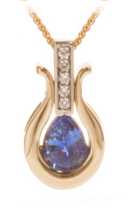 This 14k white and yellow gold sapphire (1.40ct) and diamond (0.08ctw) pendant is approximately 3/4″ in length and is offered on an 18″ round wheat chain. Call for pricing (#230-1400)

