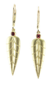 These 14k yellow gold earrings are accented with orange/red sapphires.  call for pricing (#210-01218)
