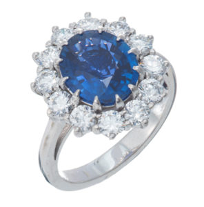 This gorgeous 3.26 carat sapphire is surrounded by diamonds and set in 18k white gold. Call for pricing (#200-1724)

