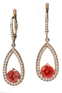 These 14k white gold teardrop earrings feature richly colored rose zircons (3.94ctw) accented with 0.47 ctw of white brilliant diamonds.  These classic earrings will be sure to dazzle. Call for pricing (#210-1216)

