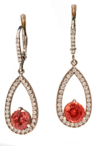 These 14k white gold teardrop earrings feature richly colored rose zircons (3.94ctw) accented with 0.47 ctw of white brilliant diamonds.  These classic earrings will be sure to dazzle. Call for pricing (#210-1216)

