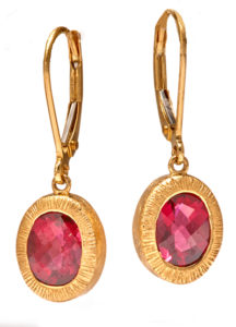 This lively checkerboard cut 3.25 ctw rhodolite garnet earrings are set in 14k yellow gold. Call for pricing (#210-1348)

