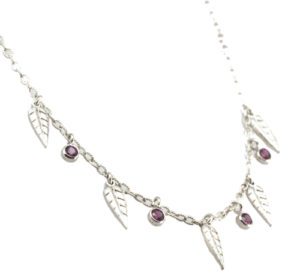 This delicate willow leaf necklace is accented with purple sapphires. call for pricing (#235-00127)

