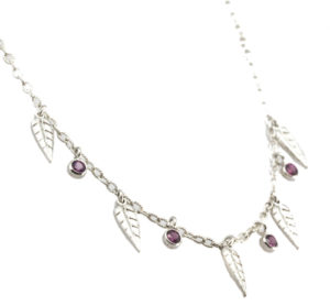 This delicate willow leaf necklace is accented with purple sapphires. call for pricing (#235-00127)
