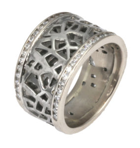 This 18k white gold ring with a rhodium finish is accented with .40 ctw of white brilliant diamonds.  The ring tapers from ½’ TO ¼”, top to bottom. Call for pricing (#130-1138)