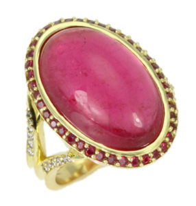 This gorgeous 13.28 carat rubellite cabochon is set in 18k yellow gold and is accented with diamonds and rubies. It’s as sweet as hard candy! Call for pricing (#200-1457)


