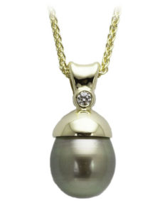 This luscious 17mm black Tahitian pearl is set in a simple bezel and accented with a diamond. Call for pricing (#322-00017)

