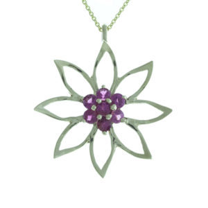 This pretty14k yellow gold flower is accented with rubellite tourmalines (0.56 ctw). The pendant is approximately 1″ in diameter. Call for pricing (#230-1584)