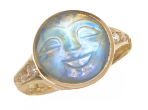 This jovial moon face moonstone is set in 14kyellow gold and is accented with diamonds. Call for pricing (#200-1856)
