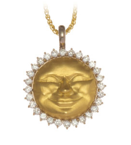 This whimsical 18k yellow gold sun face pendant is surrounded by 0.42 ctw brilliant white diamonds.  The pendant is approximately the size of a dime. Call for pricing (#160-0885)
